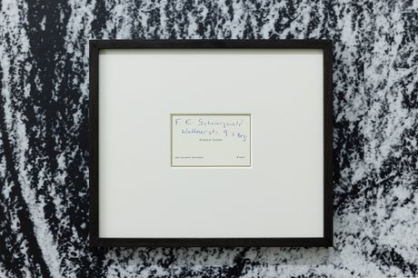 Adolf Loos's business card (with handwritten note for a child in the Prater, 1928), Ink on printed card, framed, 2025. Foto Lisa Rastl